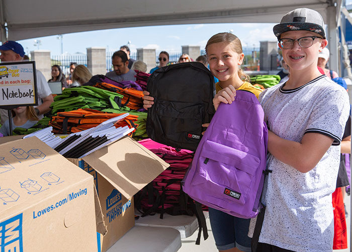 Volunteer partnerships stuff the bus STB RioTinto 10AUG2019 IMG 0391